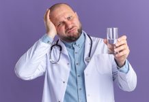 Состояние запоя: чем оно опасно https://ru.freepik.com/free-photo/regretting-middle-aged-male-doctor-wearing-medical-robe-and-stethoscope-holding-glass-of-water-keeping-hand-on-head-looking-at-front-isolated-on-purple-wall_16181739.htm#fromView=search&page=1&position=5&uuid=ef59266c-5f92-49d0-a146-9cc392184f51